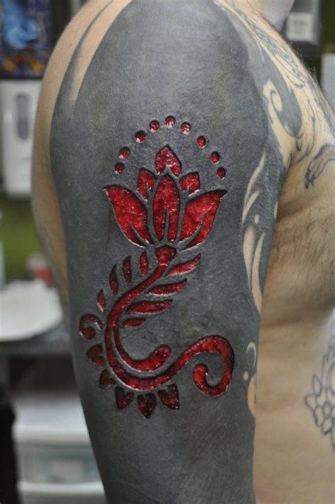 scarification over black tattoo|scarification tattoo shop near me.